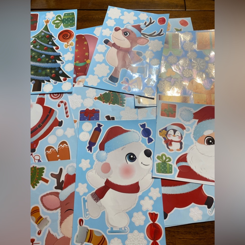 Christmas window clings.  12 in package. All different designs.  New.